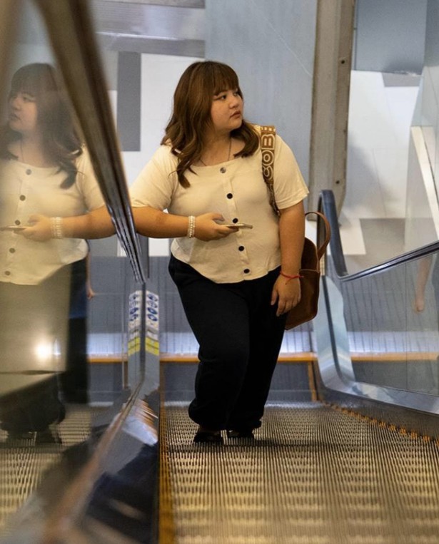 Women on escalator, eligible for study