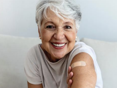 Senior women smiling post vaccine